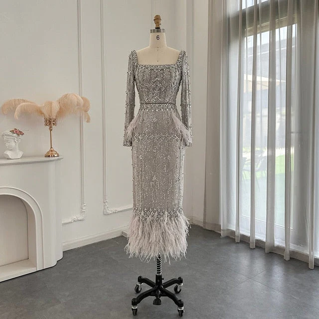 Elegant Silver Sequin Evening Dress with Feather Hem – Long Sleeve