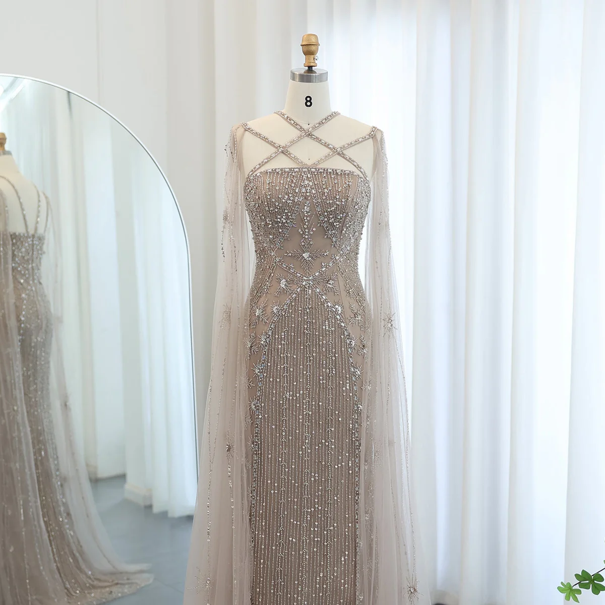 Second image of Champagne Embellished Evening Gown with Sheer Cape Sleeves