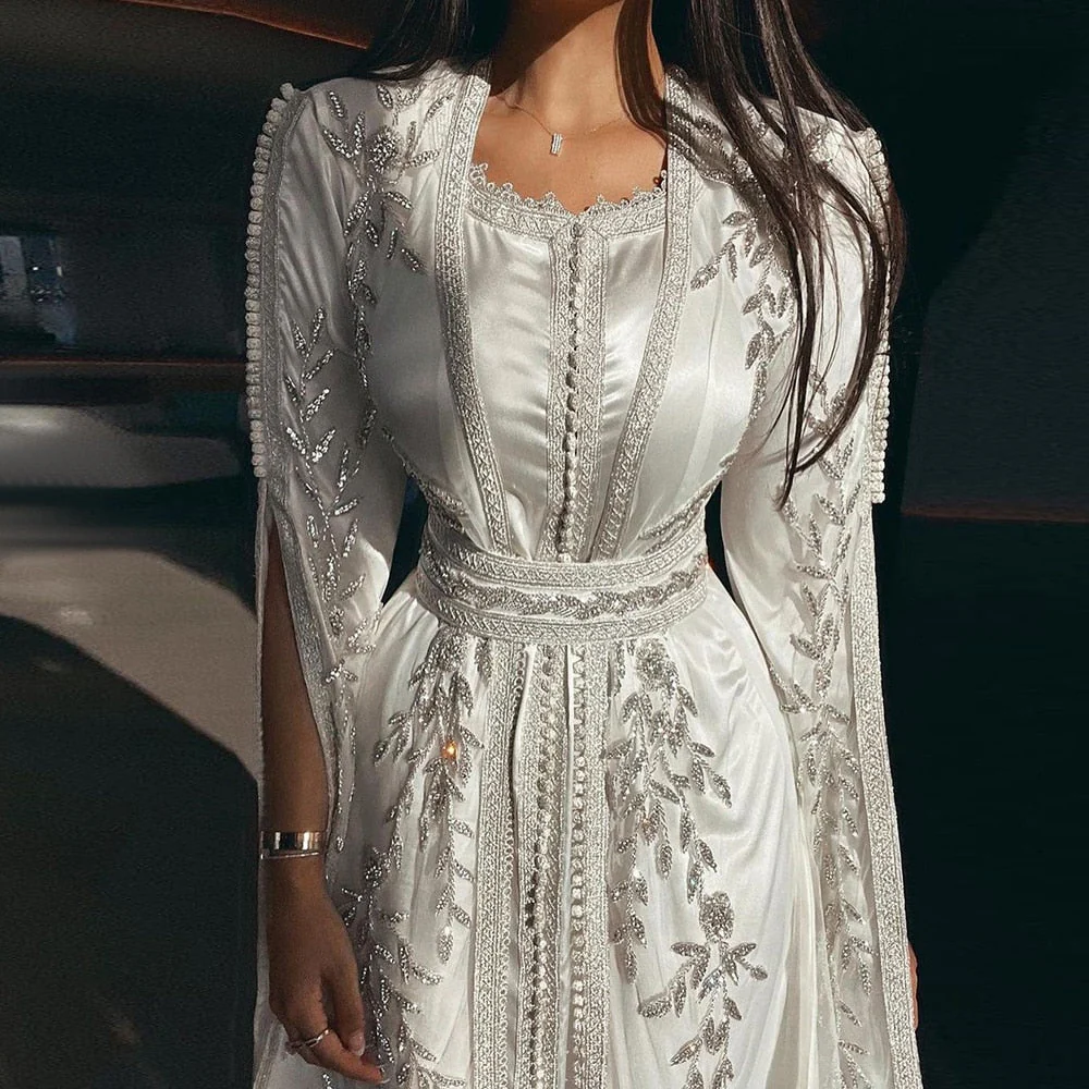Second image of White Beaded Evening Gown with Waist Belt and Cape Sleeves
