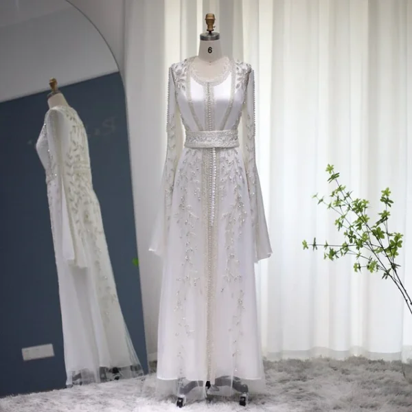 White Beaded Evening Gown with Waist Belt and Cape Sleeves