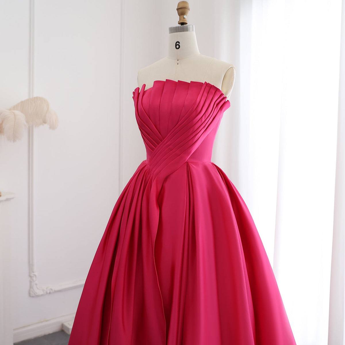 Second image of Hot Pink Strapless Pleated Ball Gown