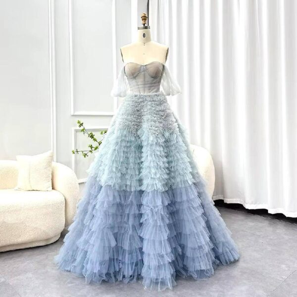 Elegant Layered Blue Ruffle Ball Gown with Sheer Corset Bodice