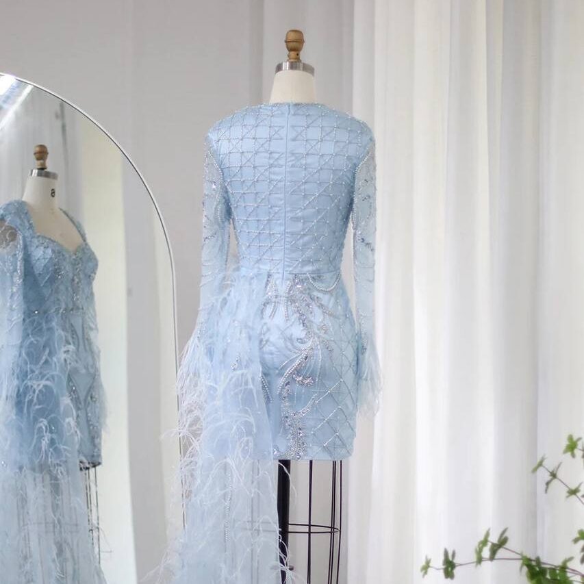 Second image of Ice Blue Embellished Mini Gown with Feather Train