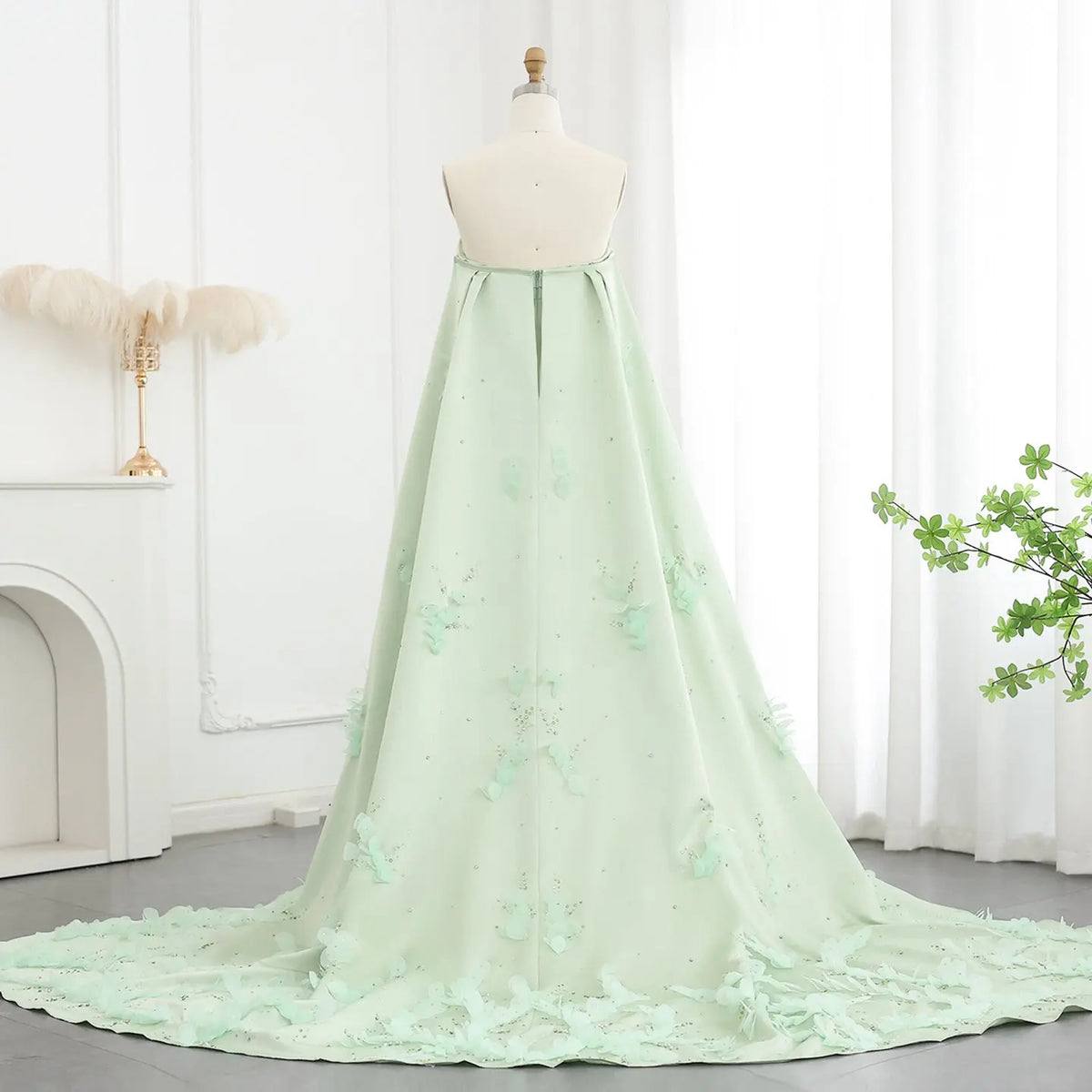 Second image of Mint Green Strapless A-Line Evening Gown with Embroidered Train & Cape