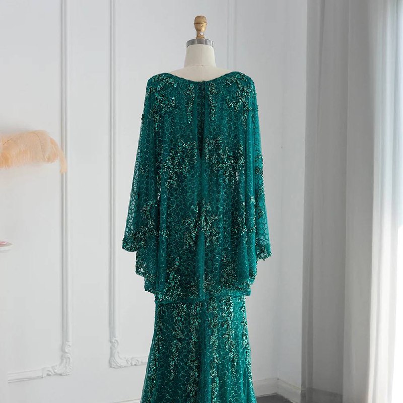 Second image of Emerald Royale Encrusted Gown with Dramatic Draped Cape Sleeves