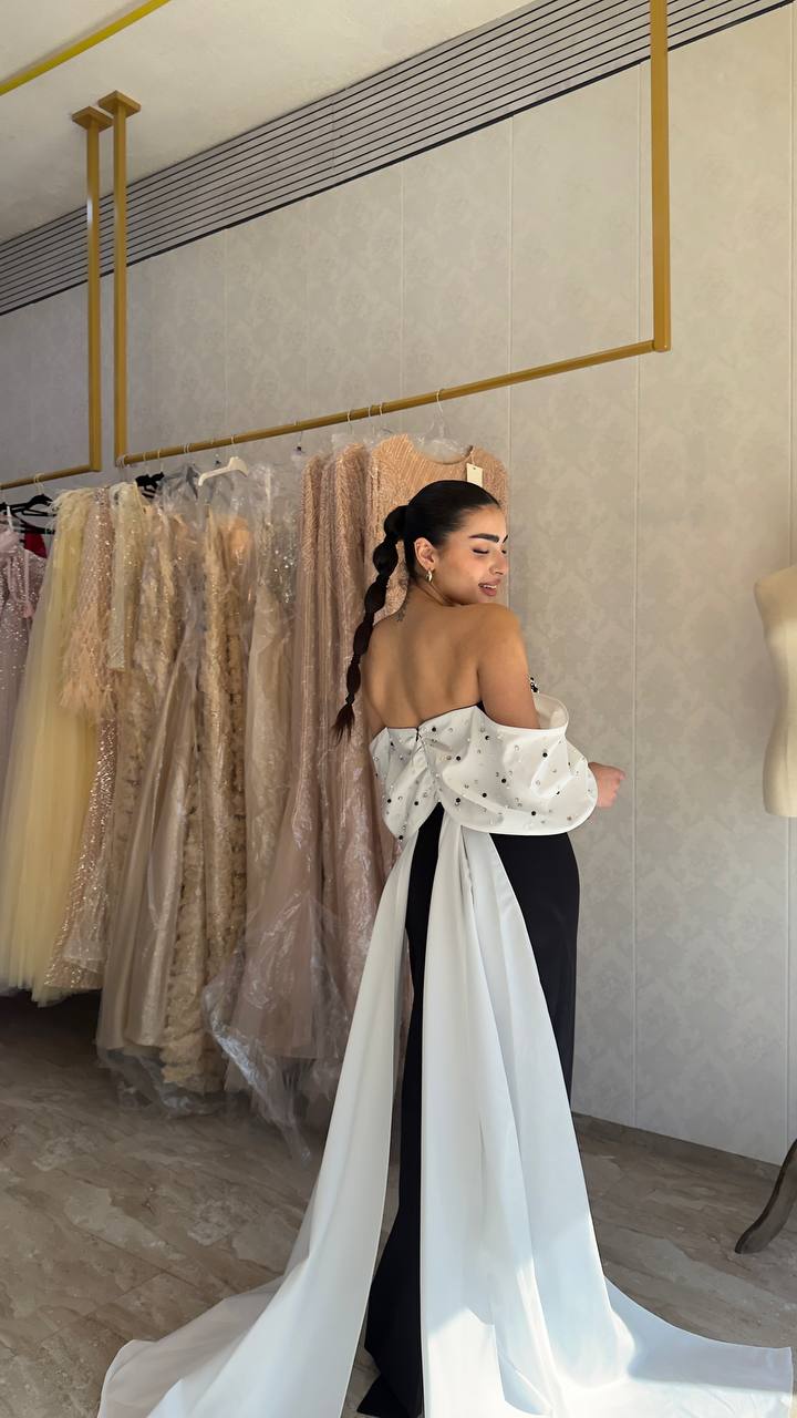 Second image of Black Strapless Gown with Blue Draped Bow Detail