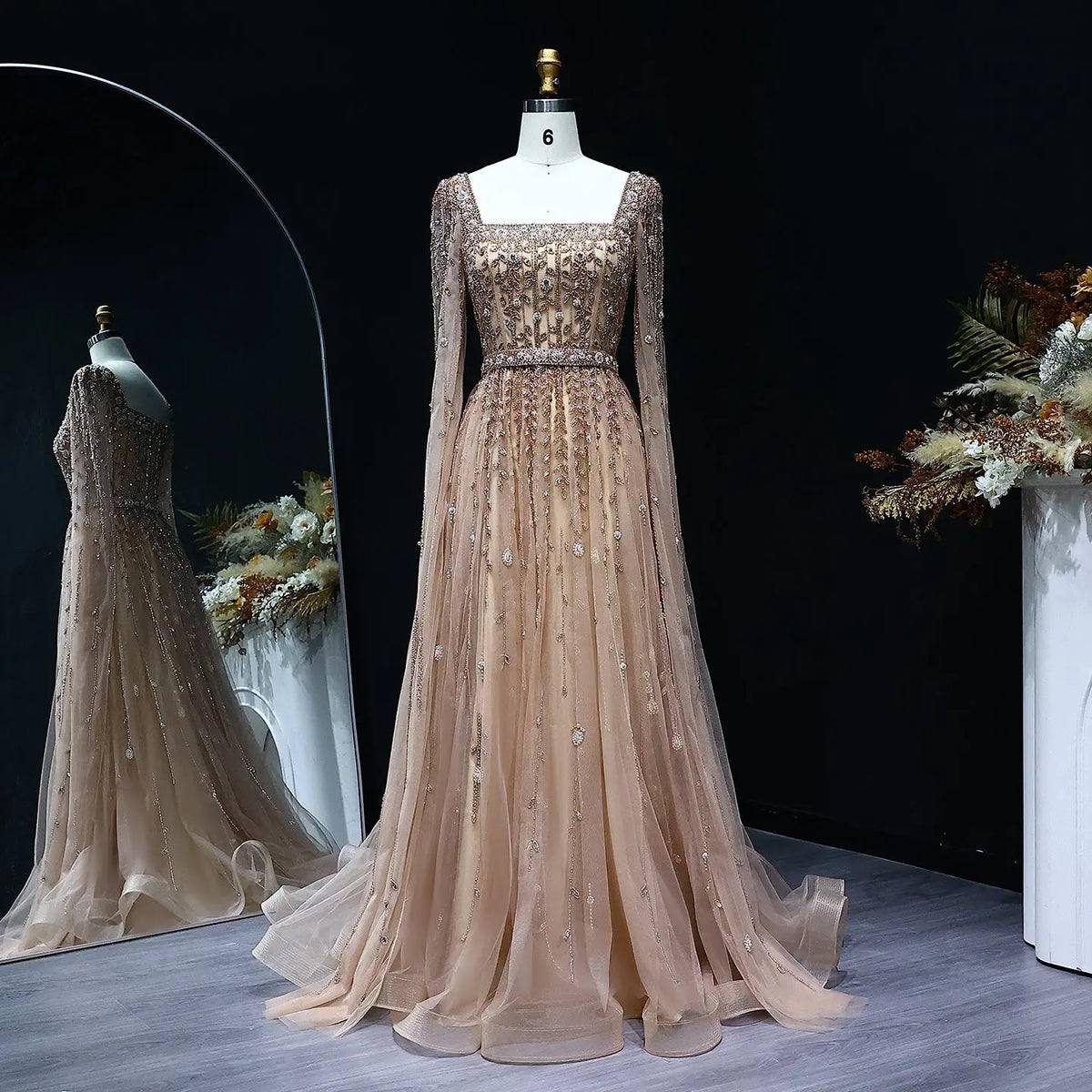 Gold-Sand Starburst Beaded Gown with Integrated Floor-Length Cape Sleeves