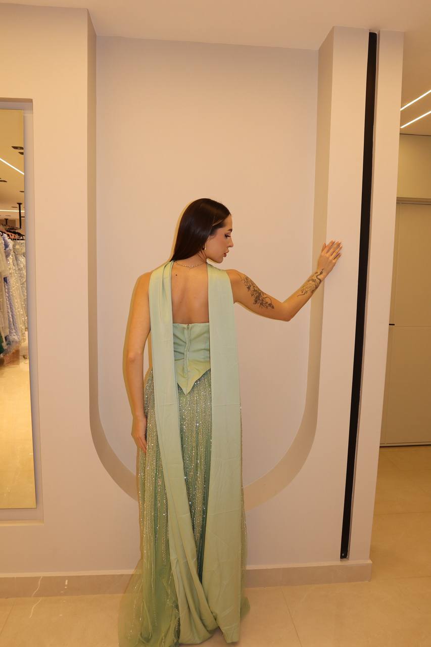 Second image of Champagne Celestial Gown with Ostrich Feather Collar and Integrated Floor-Length Cape