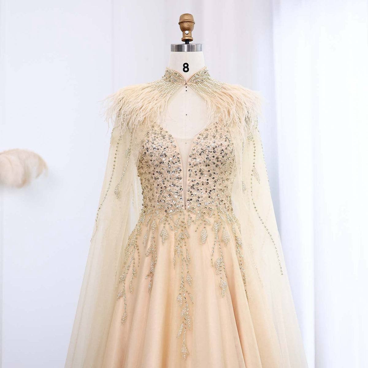 Second image of Champagne Celestial A-Line Gown with Feathered High-Neck Cape
